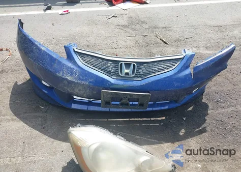 2009 Honda Fit Sport from USA, damaged, VIN JHMGE884X9C007022